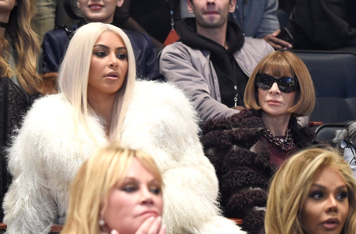 Kim Kardashian West and Anna Wintour watching the show. 