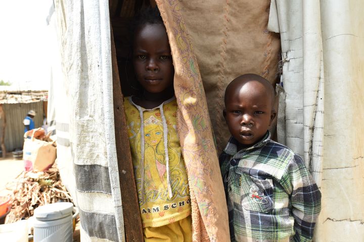 The economic crisis comes as Nigeria reels from continuing Boko Haram attacks, which have displaced some two million Nigerians. Children hide from sun at an internally displaced person's camp in Maiduguri on Feb. 4, 2016.