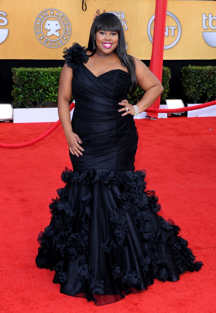 Amber Riley arrives at the 17th Annual Screen Actors Guild Awards.