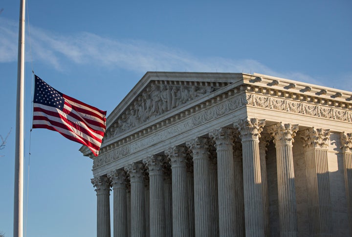 The flag at the Supreme Court flies at half-staff in honor of Justice Antonin Scalia.