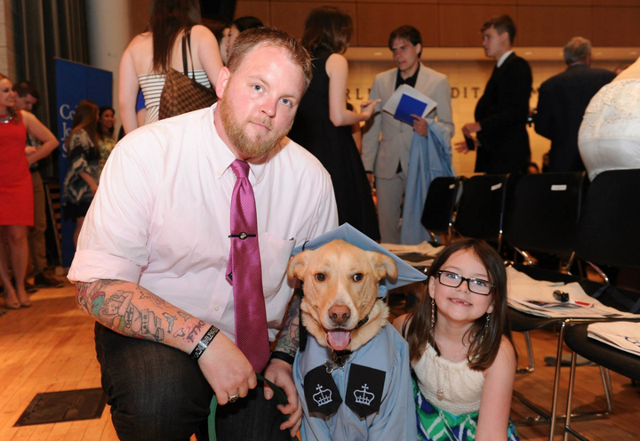 Brennan -- with his daughter, Madison, and his therapy dog, Mr. Luke -- are seen at Brennan's 2015 graduation from the Columbia University Graduate School of Journalism.