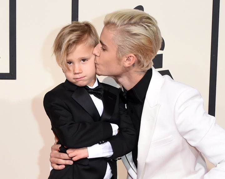 Singer Justin Bieber (R) and Jaxon Bieber attend The 58th GRAMMY Awards at Staples Center on February 15, 2016 in Los Angeles, California. (Photo by Jason Merritt/Getty Images for NARAS)