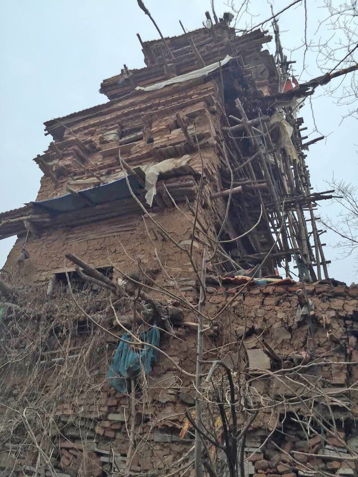 A towering seven-story home made of clay, wood and stone was built by a Chinese farmer.