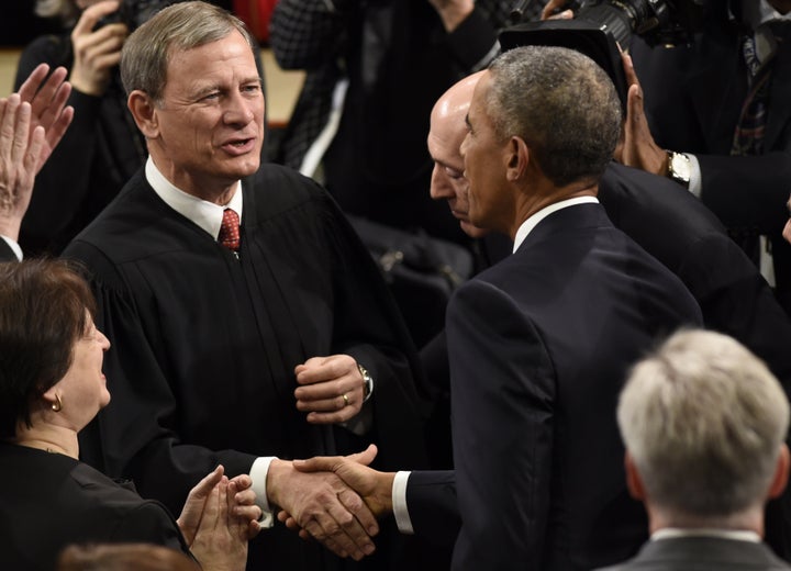 Chief Justice John Roberts mingles with the political branches for President Barack Obama's last State of the Union address on Jan. 12.