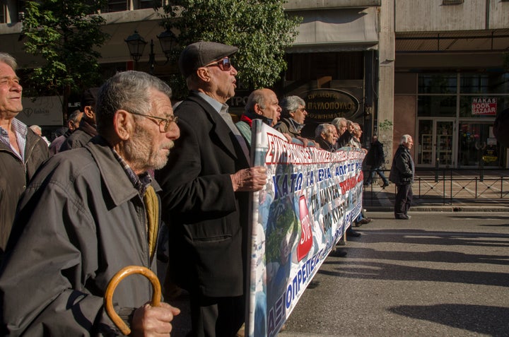 Pensioners take part in a demonstration against the government in Athens, as cuts continue, on Jan. 19, 2016.