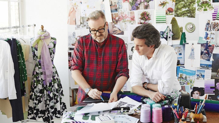 Leon Green, Talbots senior vice president of apparel and design, and O creative director Adam Glassman confer over sketches.