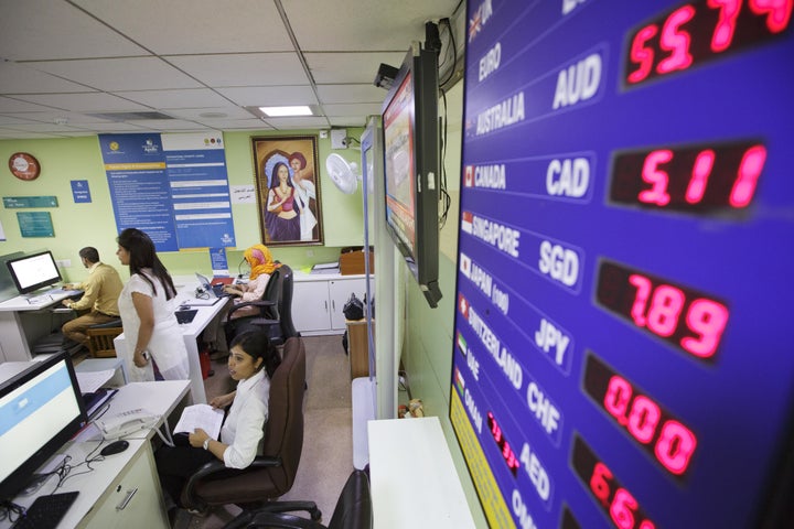 Foreign exchange rates are displayed at the Indraprastha Apollo Hospitals facility in New Delhi.