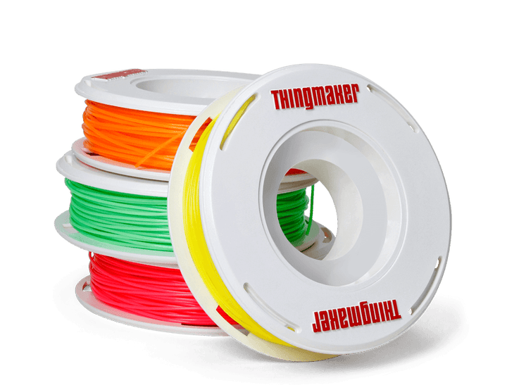 Spools of PLA plastic filament are used for 3D printing.