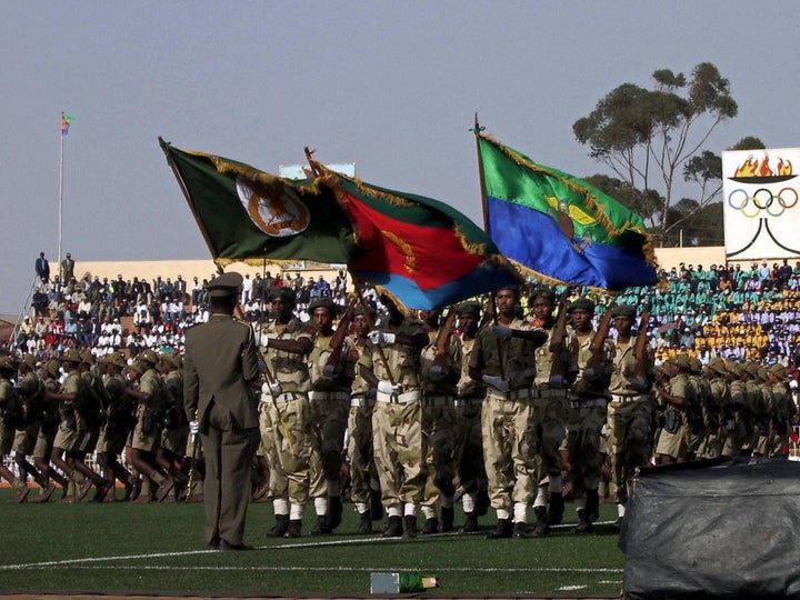 Eritrean soldiers parade during independence day celebrations in 2007. Afwerki has turned from a popular rebel leader to an "unhinged dictator," according to leaked U.S. diplomatic cables.