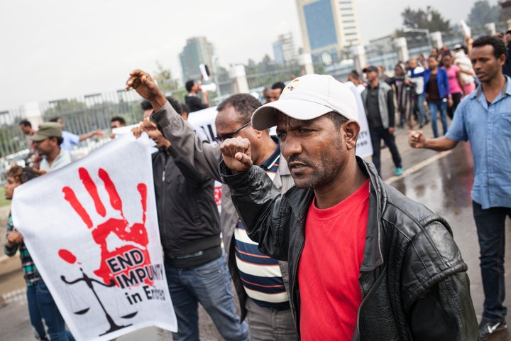 Hundreds of Eritreans demonstrate in front of the African Union headquarters in Addis Ababa after the U.N. inquiry report was published in June. The report detailed the harrowing testimonies of torture, extrajudicial execution and forced labor and conscription.