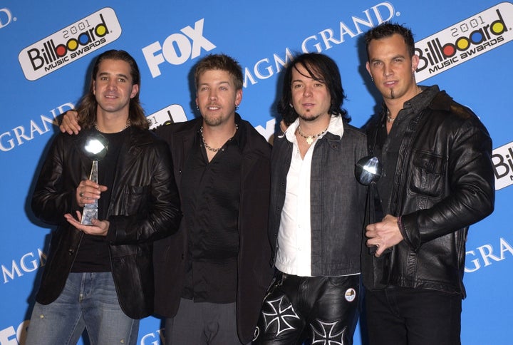 Creed was together for more than a decade. Stapp, far left, says he was "devastated" when they split in 2004.