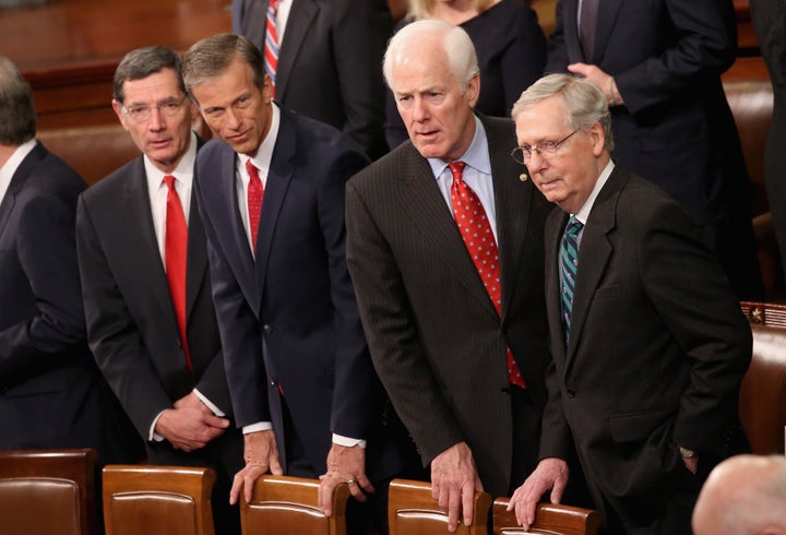Senate Majority Leader Mitch McConnell (R-Ky.) arrives before President Barack Obama delivers the State of the Union speech b