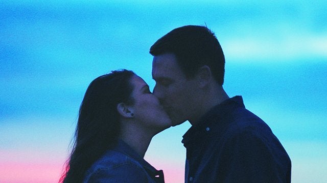 The pair sharing a sweet post-proposal smooch.