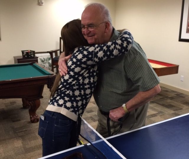 Jenkin's hugs a Deerfield resident.