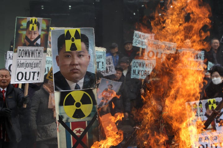 South Korean protesters burn an effigy of North Korea leader Kim Jong-Un during an anti-North Korea rally on February 11, 2016 in Seoul, South Korea.