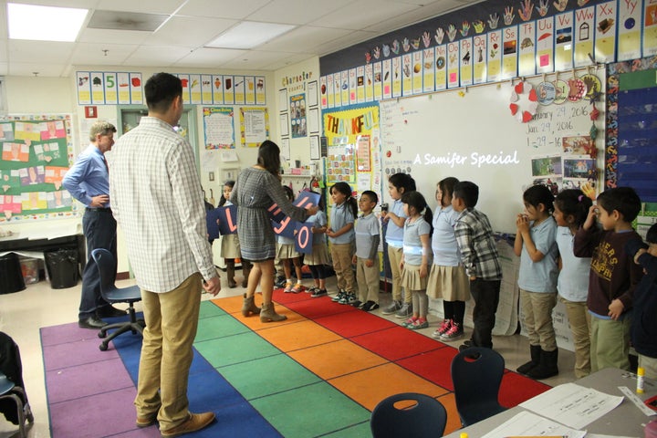 The first graders preparing for the big moment. The kids were saying things like, "I’m so nervous!" and "Ms. Lai’s gonna marry a man! In there!" and “Are they gonna kiss?!"