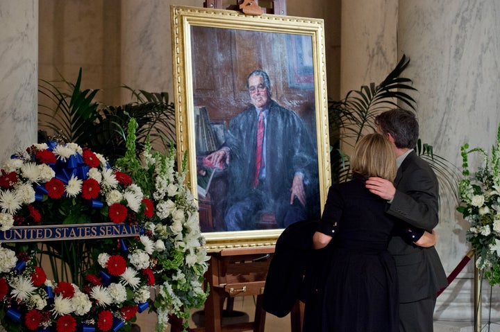 A portrait of the late Justice Antonin Scalia as he lay in repose Friday at the Great Hall of the U.S. Supreme Court.