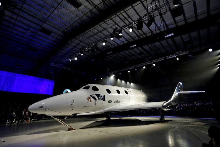 The new Virgin Galactic SpaceShipTwo at its roll out in the Mojave Desert, about a year and a half after Virgin's last rocket plane broke into pieces and killed the test pilot.