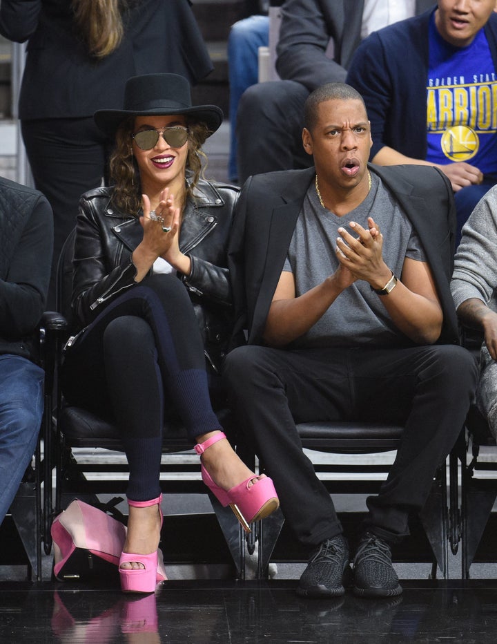Beyoncé and Jay Z attend a basketball game between the Golden State Warriors and the Los Angeles Clippers on Feb. 20,