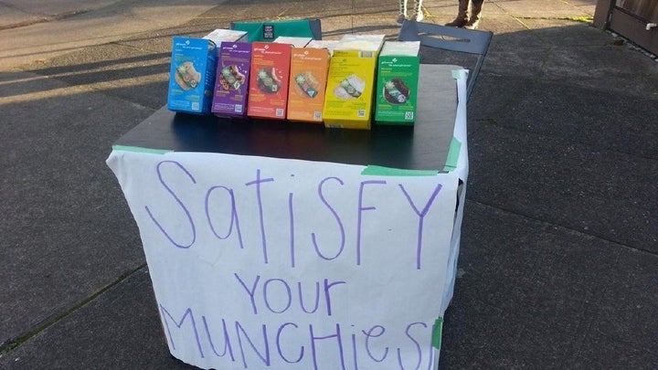 A girl scout reportedly topped her sales goal after setting up a cookie booth, pictured, outside of a marijuana dispensary in Oregon.