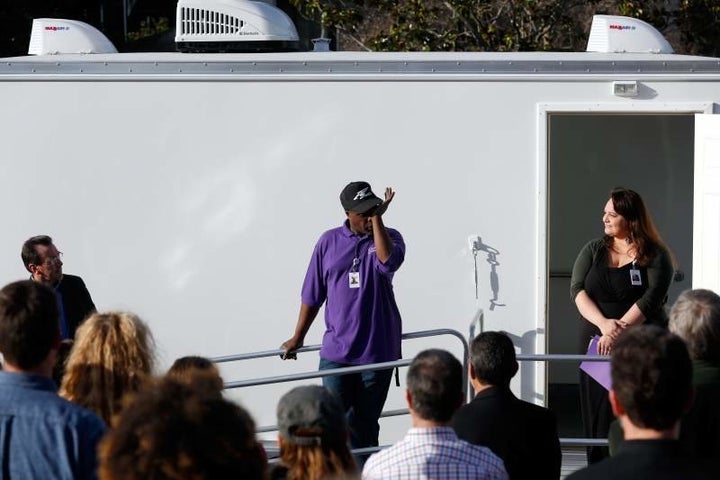 Rodney Hill, who was homeless for nearly five years, gets emotional while addressing people gathered for the unveiling of the trailer on February 12, 2016. He will be operating the mobile shower.