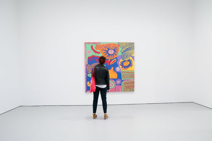 This is actually me, looking at a Yayoi Kusama painting, at an art gallery.