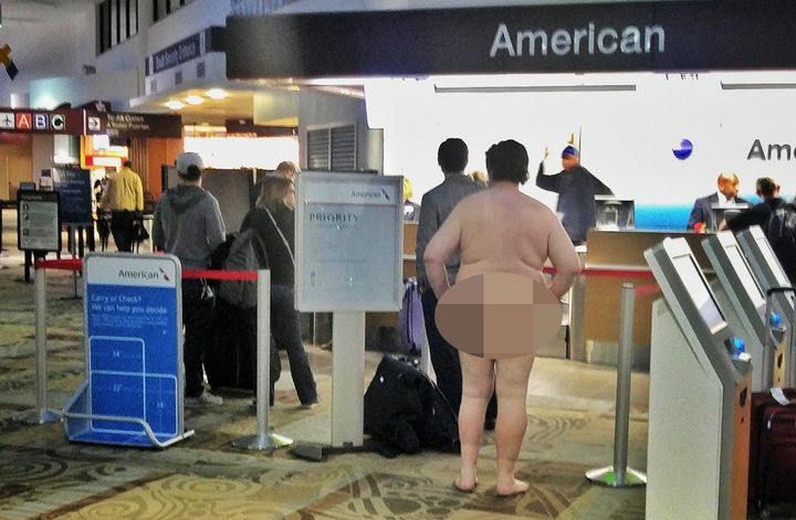 A man was photographed walking around the Nashville airport in the buff on Sunday.