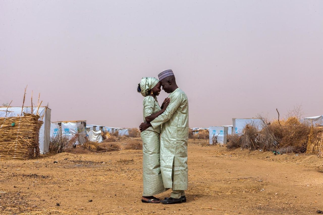 Newlyweds Ibrahim and Hauna John embrace in the Minawao camp for Nigerian refugees in Far North Region of Cameroon the day after their wedding in April 2015.