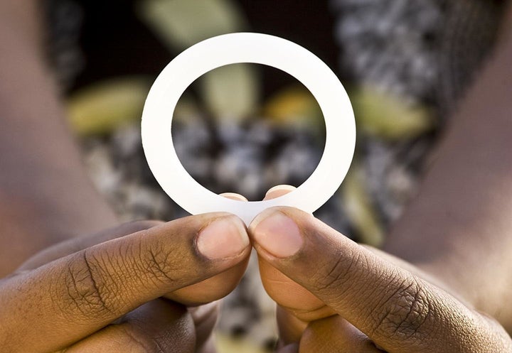 This is a woman holding the dapivirine vaginal ring tested in the NIH-funded ASPIRE study.