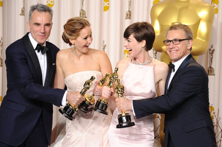 Actor Daniel Day-Lewis, actress Jennifer Lawrence, actress Anne Hathaway and actor Christoph Waltz poses at the 85th Annual A