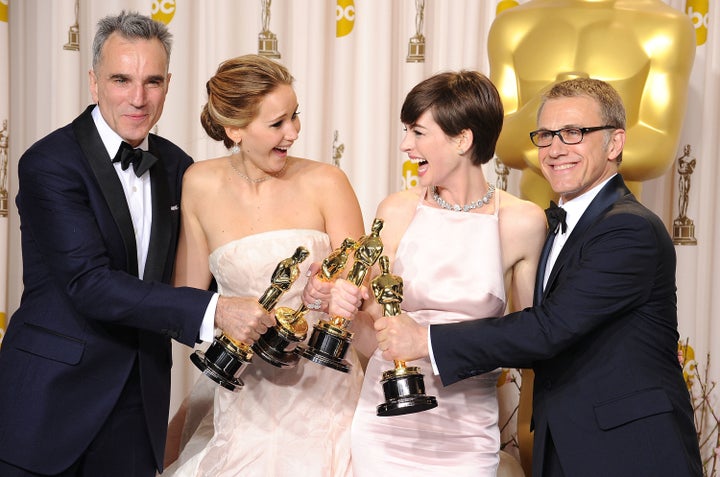 Actor Daniel Day-Lewis, actress Jennifer Lawrence, actress Anne Hathaway and actor Christoph Waltz poses at the 85th Annual Academy Awards at Dolby Theatre on February 24, 2013 in Hollywood, California.