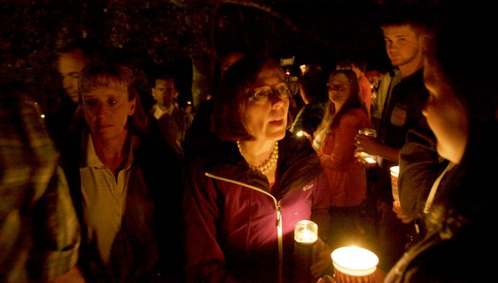 Brown attended a candlelight vigil for the victims of a shooting at Umpqua Community College in Roseburg, Oregon.