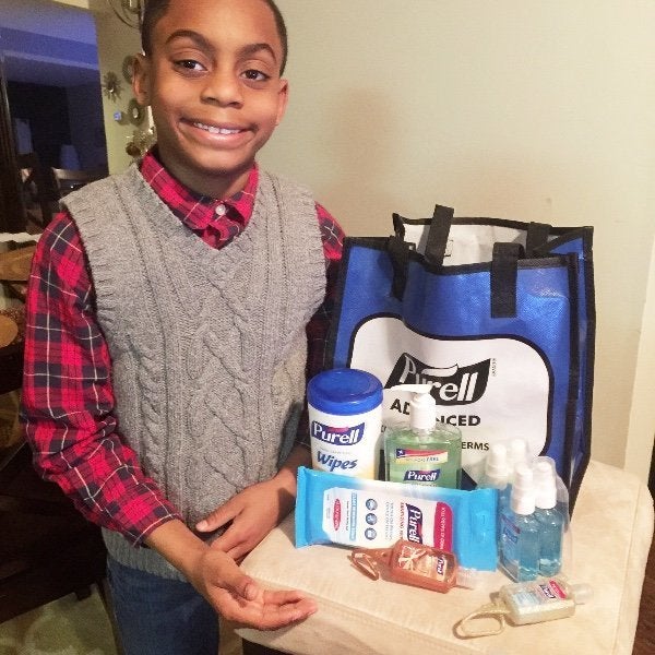 Isiah is beaming after helping kids in Flint.