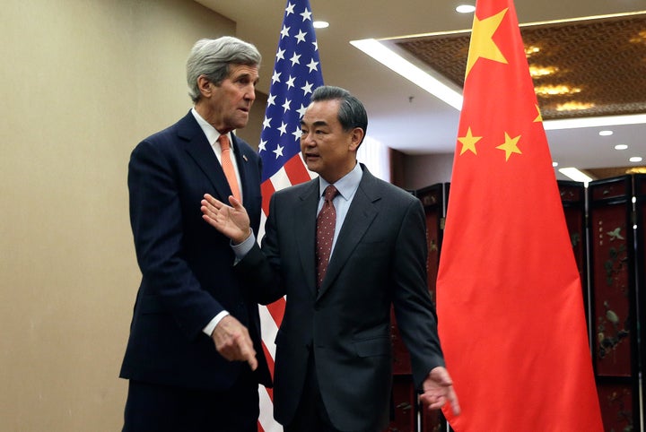 U.S. Secretary of State John Kerry and Chinese Foreign Minister Wang Yi meet in Beijing, China. The U.S. and China have sparred over the two countries' growing militarization in the South China Sea.