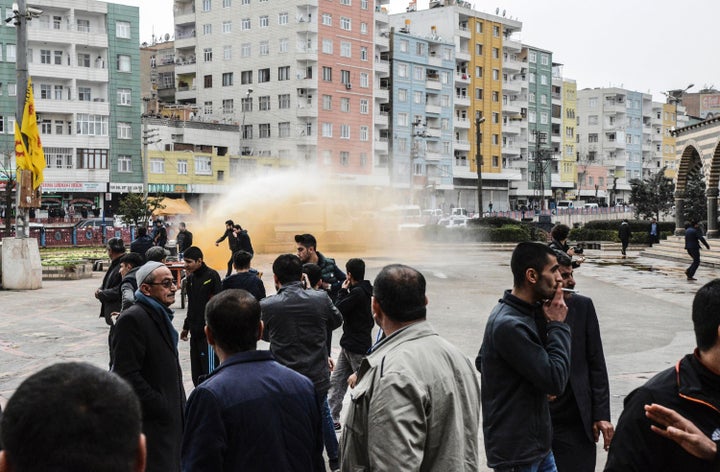 Scenes from a protest against government-imposed curfews in the Kurdish region of Turkey.