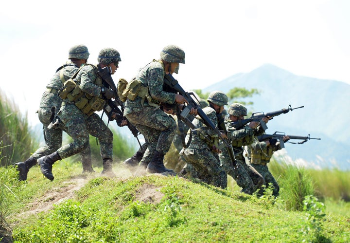 Members of the Philippine Marines take part in joint naval exercises with the U.S. near the South China Sea. The U.S. has no direct claims to the South China Sea but has a variety of economic and political interests in the region. 