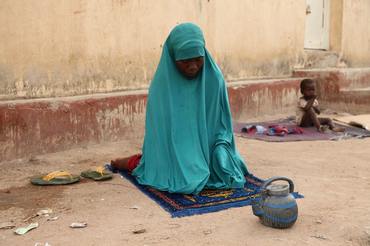 A woman rescued by Nigerian soldiers from Islamist militants Boko Haram.