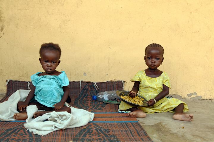 Children rescued by Nigerian soldiers from Boko Haram sit together at Malkohi refugee camp, on May 5, 2015. They were among almost 700 women and children rescued from Boko Haram's clutches in the previous week.