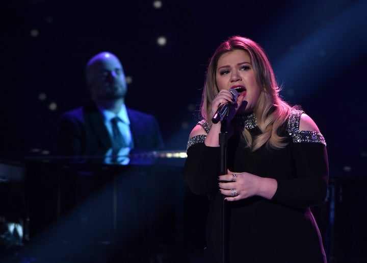 Guest judge and Season 1 winner Kelly Clarkson performs onstage at FOX's American Idol Season 15 on February 25, 2016 in Holl