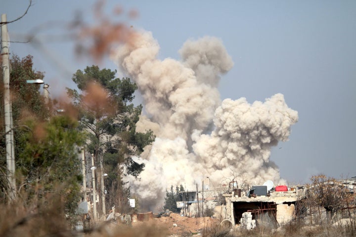 Fighting raged in Syria hours before an agreement to cease hostilities was due to take place. In this photo, smoke rises foll