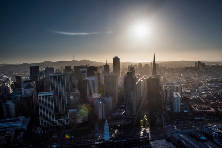 The Transamerica Pyramid building, right, stands in the skyline of downtown in this aerial photograph taken above San Francisco, California, U.S., on Monday, Oct. 5, 2015. While the tech industry is booming in the Bay Area, long-time residents are struggling to afford climbing rents.