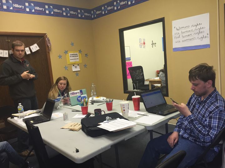 Staff and volunteers make phone calls at Hillary Clinton's Overland Park, Kansas, field office on Feb. 24, 2016.
