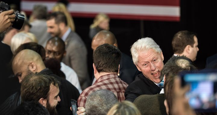 Former President Bill Clinton mingles with the crowd while campaigning for his wife, Democratic presidential candidate Hillary Clinton, Feb. 25, 2016 in Rock Hill, South Carolina.