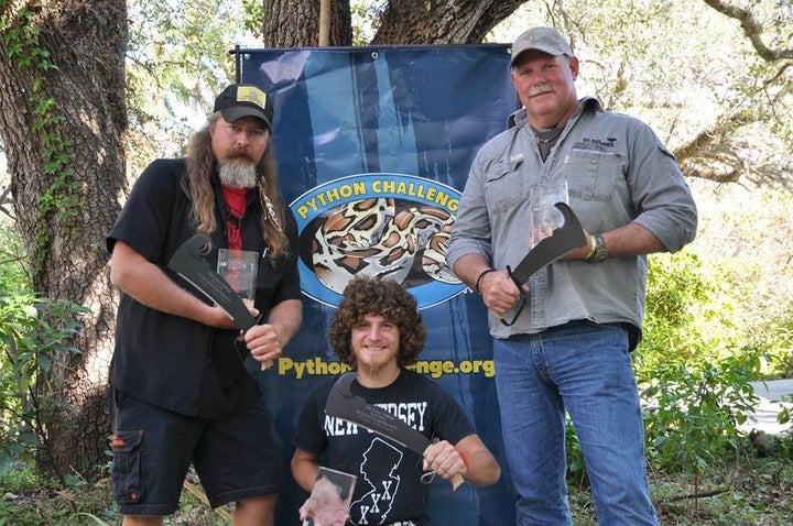 Winners: Daniel Moniz, center, is seen with two members of the winning team, Cypress Boys.