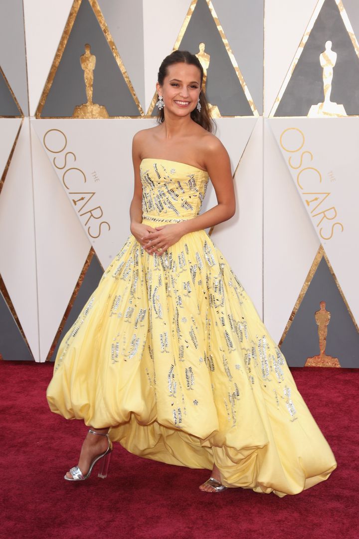 Alicia Vikander hits the Oscars red carpet in Louis Vuitton. 