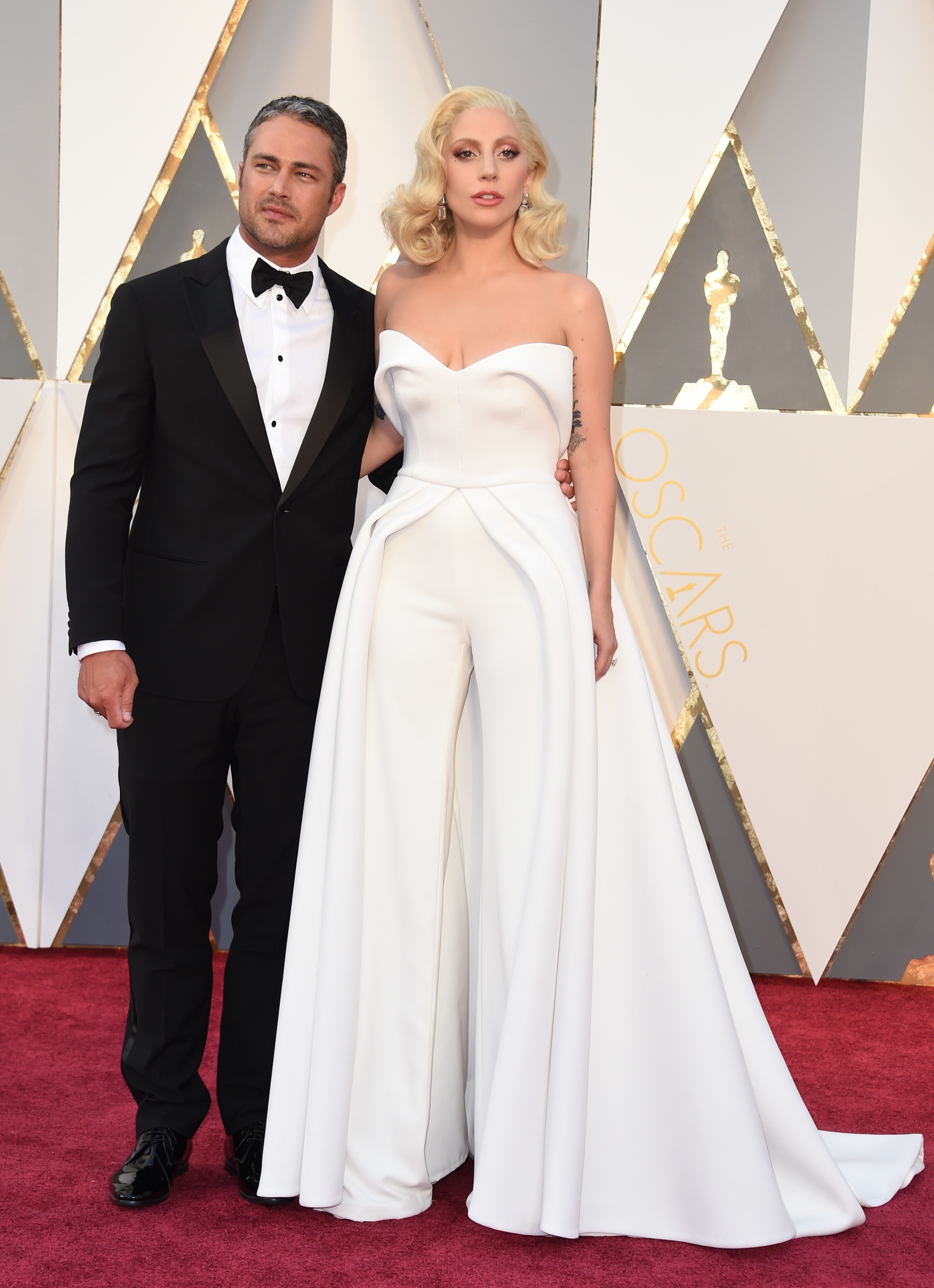 Lady Gaga And Taylor Kinney Give Off Major Wedding Vibes At The Oscars ...