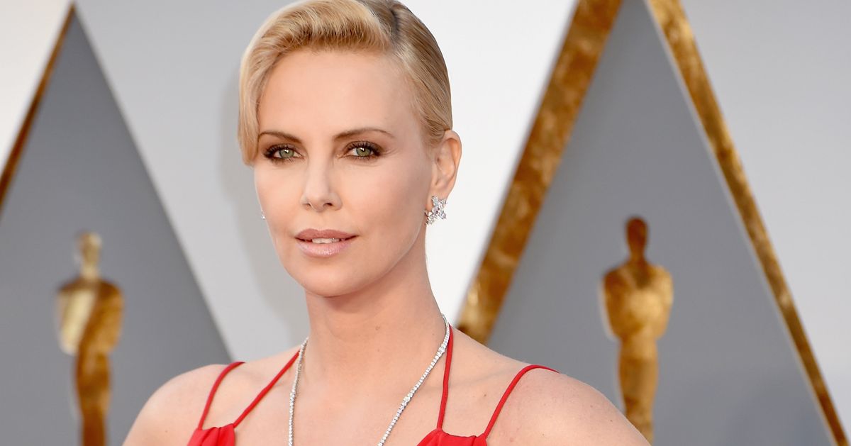 Charlize Theron Knocks Everyone's Socks Off In Red At The 2016 Oscars ...