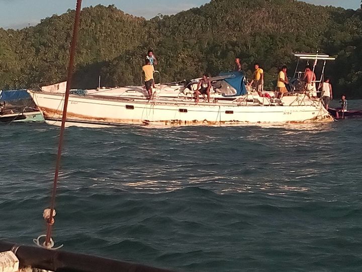 Fishermen reported finding the mummified body of a man inside this drifting yacht.