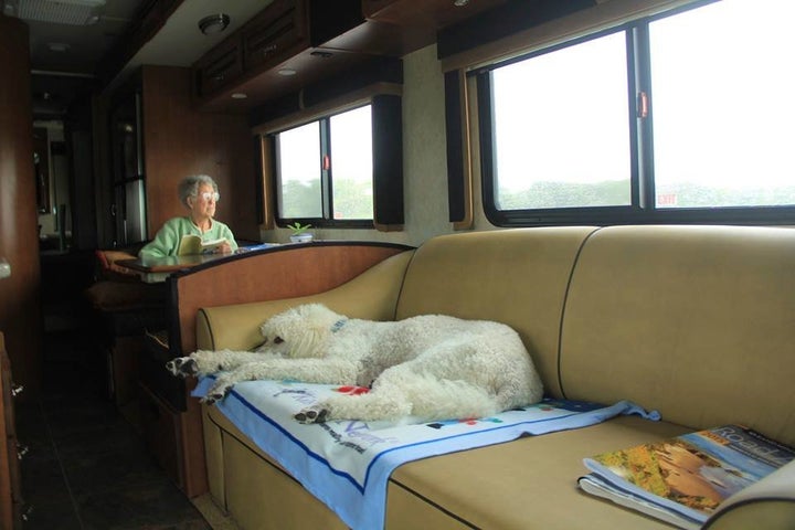 Norma relaxing inside the RV.