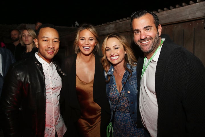 De Laurentiis and Farley stopped and chatted with John Legend and Chrissy Teigen.